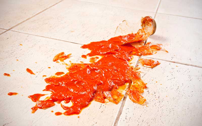 tomato sauce on kitchen floor