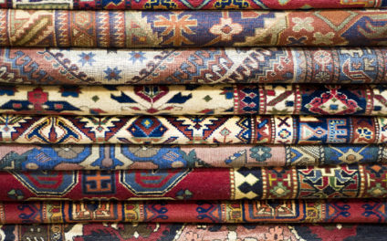 A background of fine Asian rugs.