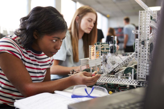 College Students Building Machine In Science Robotics