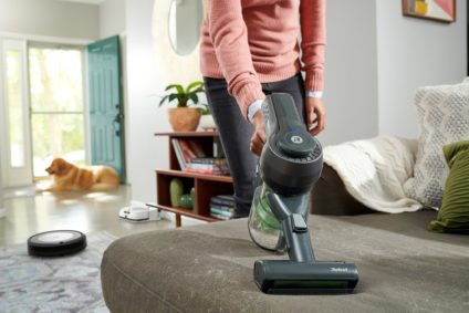 cleaning sofa with vacuum