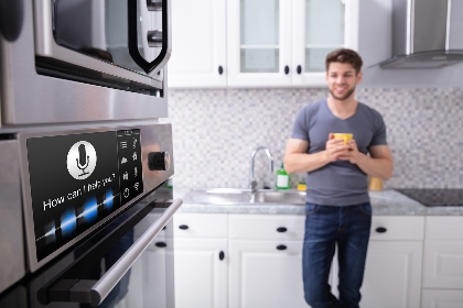 man looking at oven